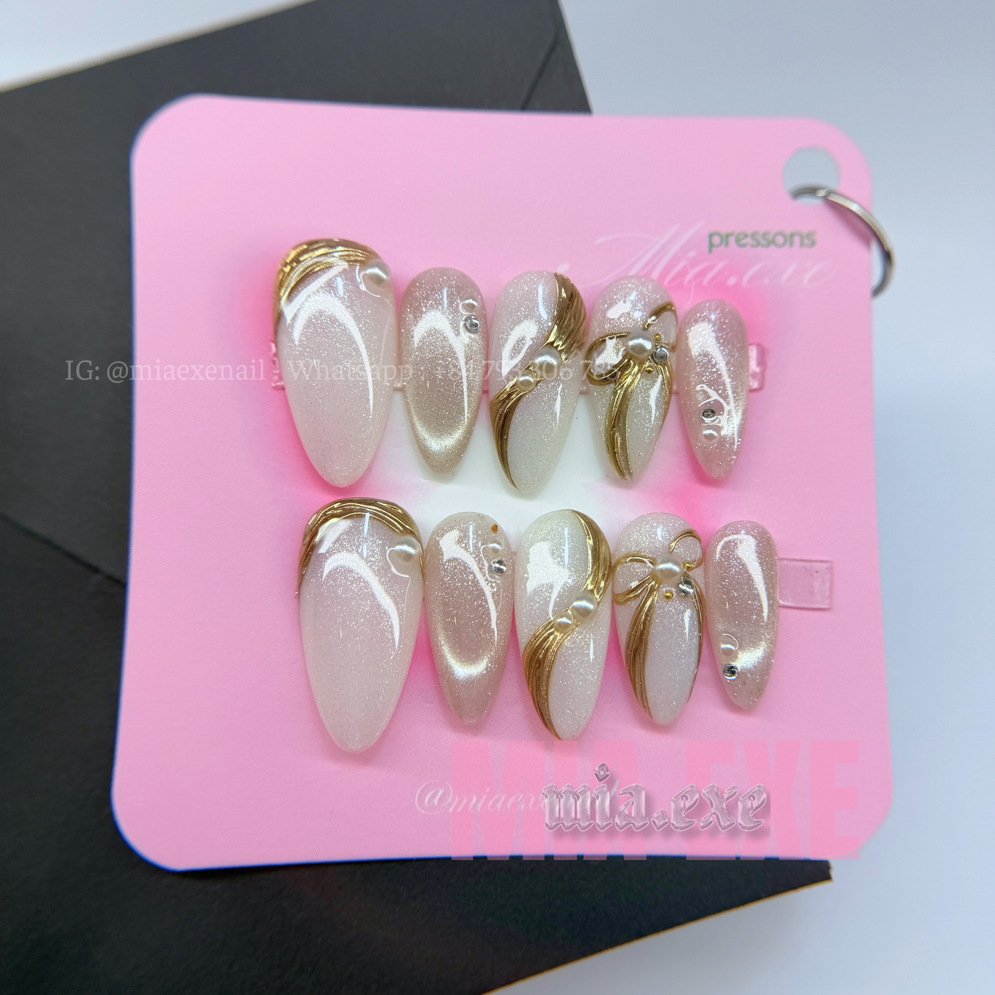 Press on Nails | Pearlescent Nude Cat Eye with Gold Swirl & Pearl Bow Accents, Daily Nail Style, Stiletto Shape, Medium Length Luxury Handmade Fake Nails