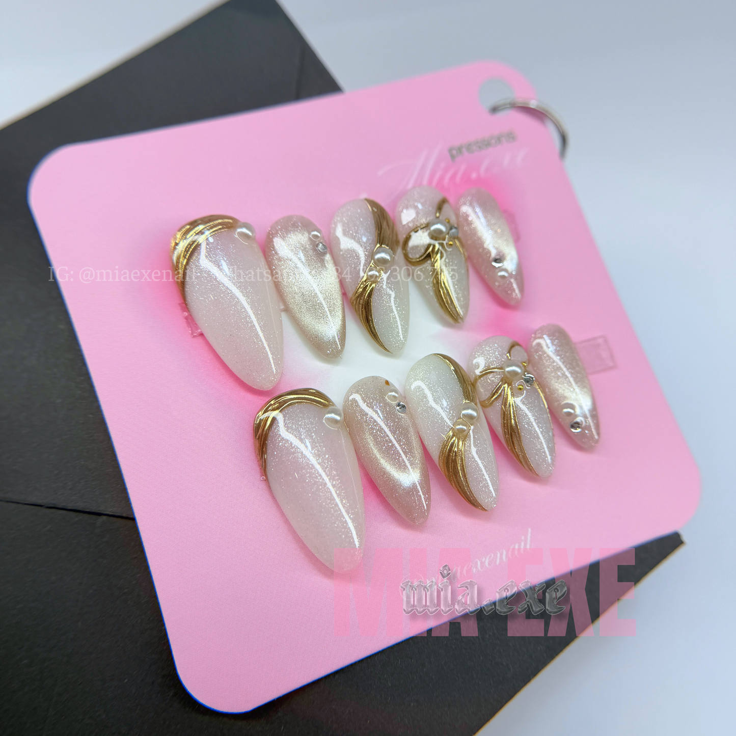 Press on Nails | Pearlescent Nude Cat Eye with Gold Swirl & Pearl Bow Accents, Daily Nail Style, Stiletto Shape, Medium Length Luxury Handmade Fake Nails