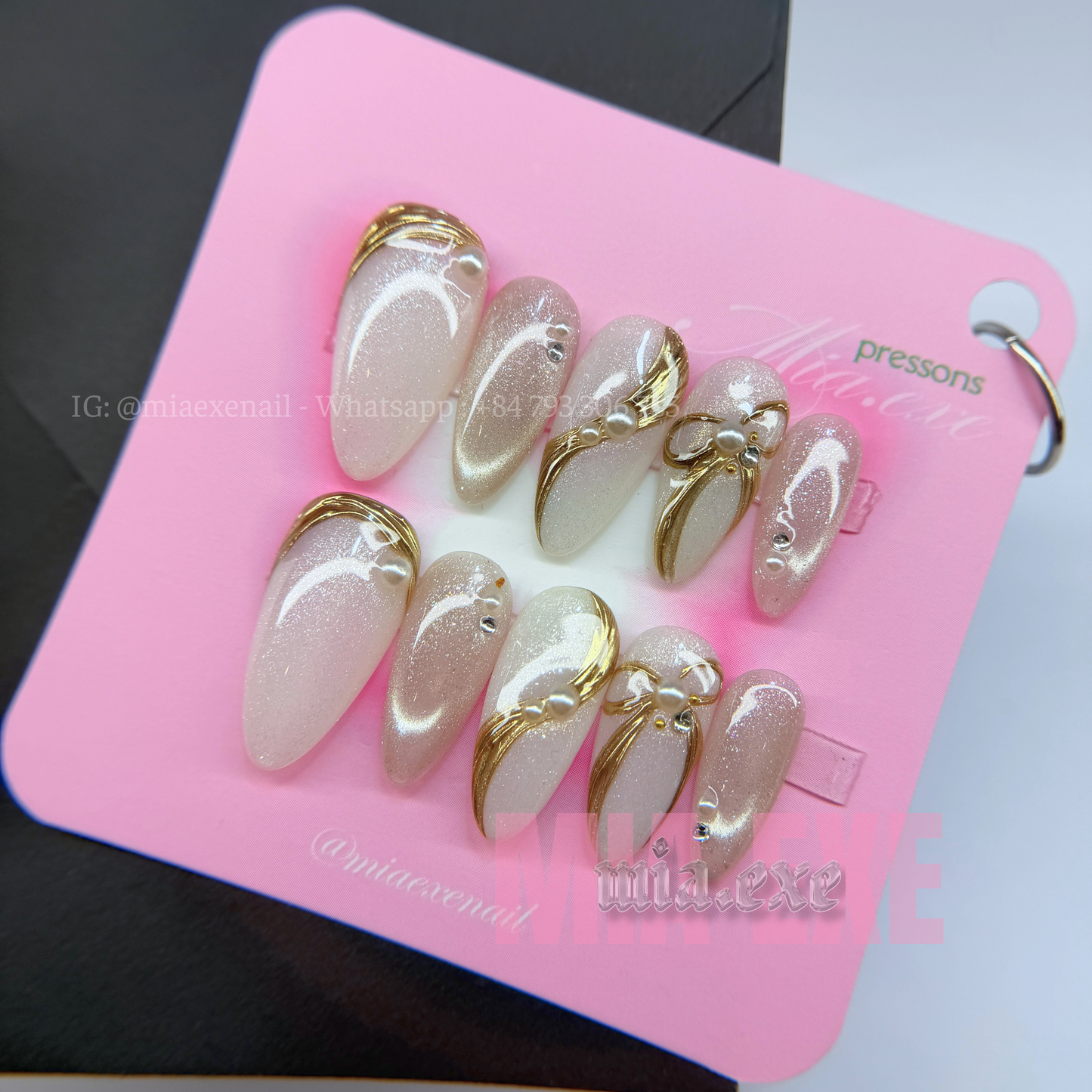 Press on Nails | Pearlescent Nude Cat Eye with Gold Swirl & Pearl Bow Accents, Daily Nail Style, Stiletto Shape, Medium Length Luxury Handmade Fake Nails