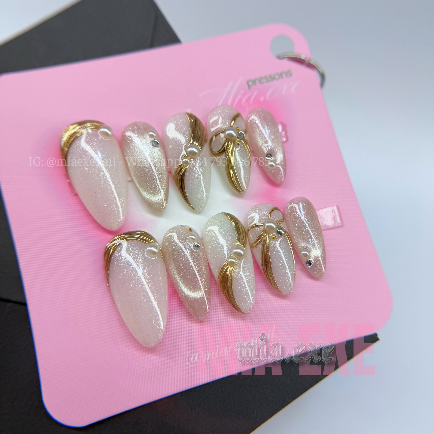 Press on Nails | Pearlescent Nude Cat Eye with Gold Swirl & Pearl Bow Accents, Daily Nail Style, Stiletto Shape, Medium Length Luxury Handmade Fake Nails