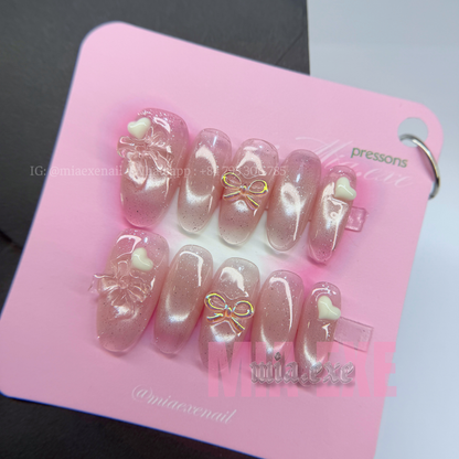 Press on Nails | Pink Cat Eye with 3D Bow & Heart Charms, Daily Nail Style, Almond Shape, Medium Length Luxury Handmade Fake Nails