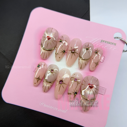 Press on Nails | Nude Cat Eye with Celestial Gold Star & Bow Accents, Daily Nail Style, Almond Shape, Medium Length Luxury Handmade Fake Nails