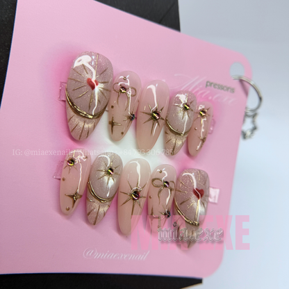 Press on Nails | Nude Cat Eye with Celestial Gold Star & Bow Accents, Daily Nail Style, Almond Shape, Medium Length Luxury Handmade Fake Nails