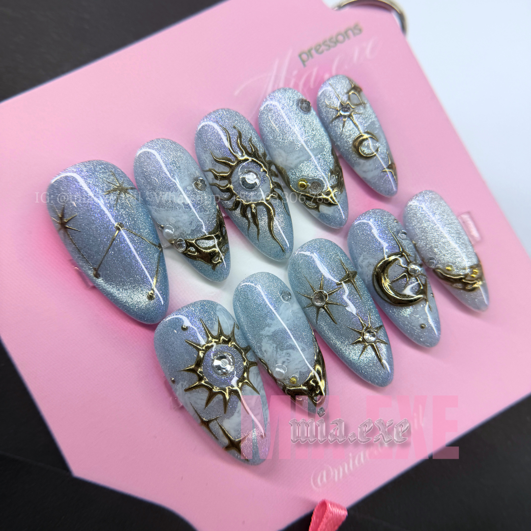 Press on Nails | Purple & Blue Cat Eye with Celestial Star & Moon Accents, Stiletto Shape, Medium Length Luxury Handmade Fake Nails