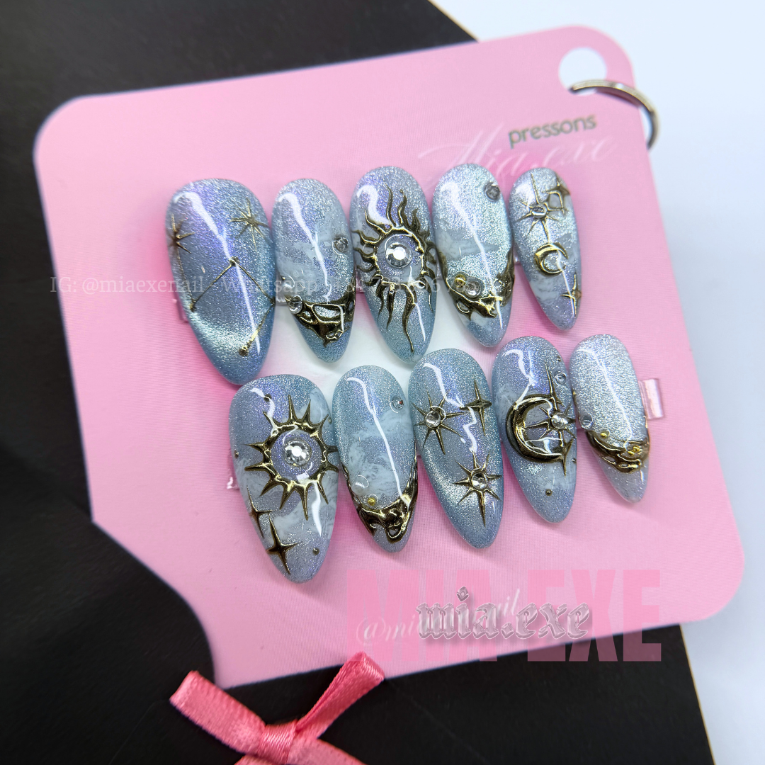 Press on Nails | Purple & Blue Cat Eye with Celestial Star & Moon Accents, Stiletto Shape, Medium Length Luxury Handmade Fake Nails