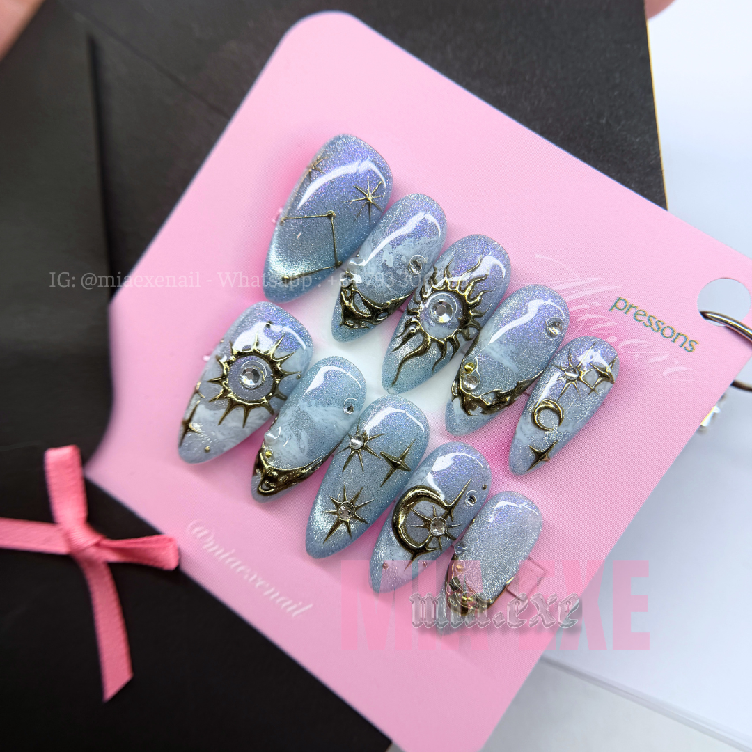 Press on Nails | Purple & Blue Cat Eye with Celestial Star & Moon Accents, Stiletto Shape, Medium Length Luxury Handmade Fake Nails