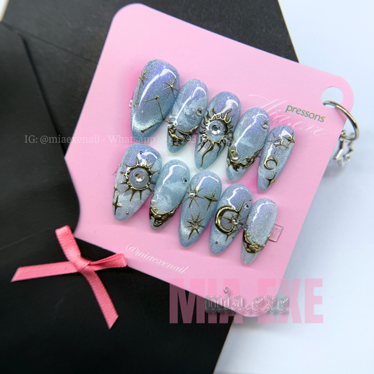 Press on Nails | Purple & Blue Cat Eye with Celestial Star & Moon Accents, Stiletto Shape, Medium Length Luxury Handmade Fake Nails