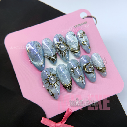 Press on Nails | Purple & Blue Cat Eye with Celestial Star & Moon Accents, Stiletto Shape, Medium Length Luxury Handmade Fake Nails