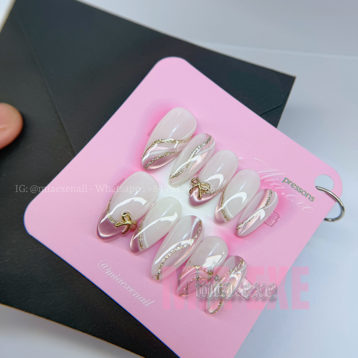 Press on Nails | Nude & Gold Glitter Swirl with Bow Charm, Daily Nail Style, Almond Shape, Medium Length Luxury Handmade Fake Nails